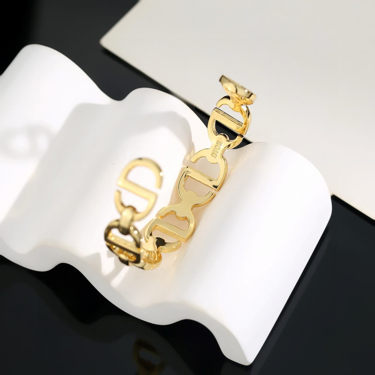 Louis Vuitton Christian Gold Tone Cuff Bracelet
